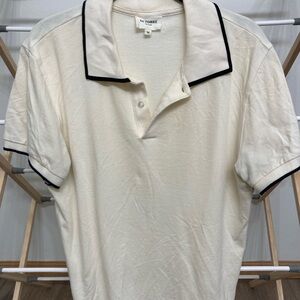 Octobre Editions Men's Cream Polo with Black Accents